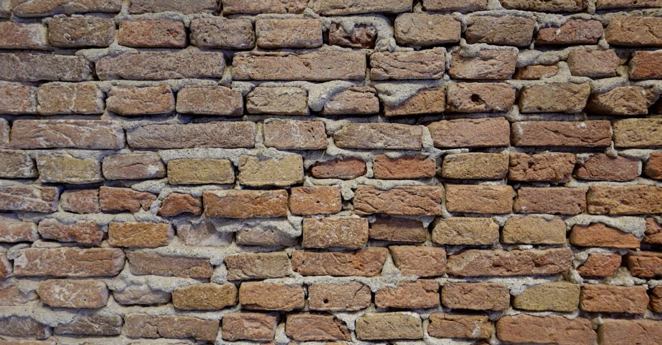 Zaprawa czy klej – wybór materiału do trwałego murowania ścian